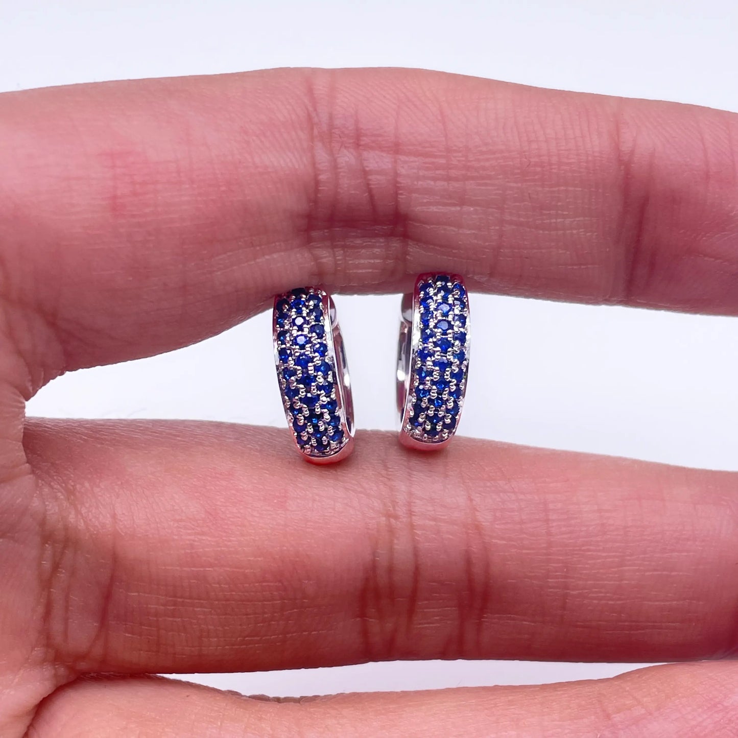 14 Carat White Gold Blue Sapphire Pair of Hoop Earrings 0.33 carats 4mm wide 