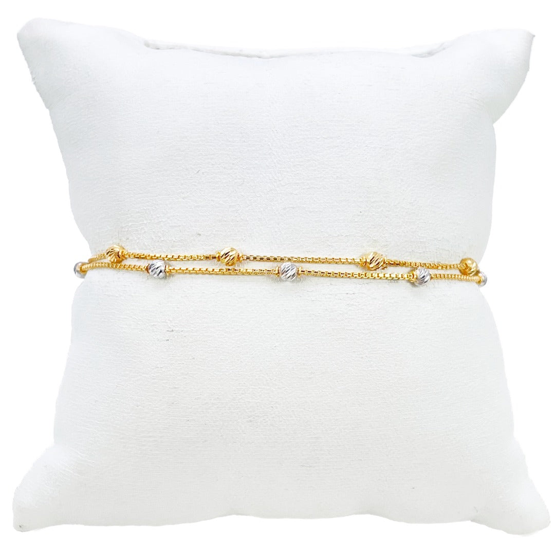 Bracelet en or jaune 22 carats à double chaîne avec perles bicolores taillées en diamant