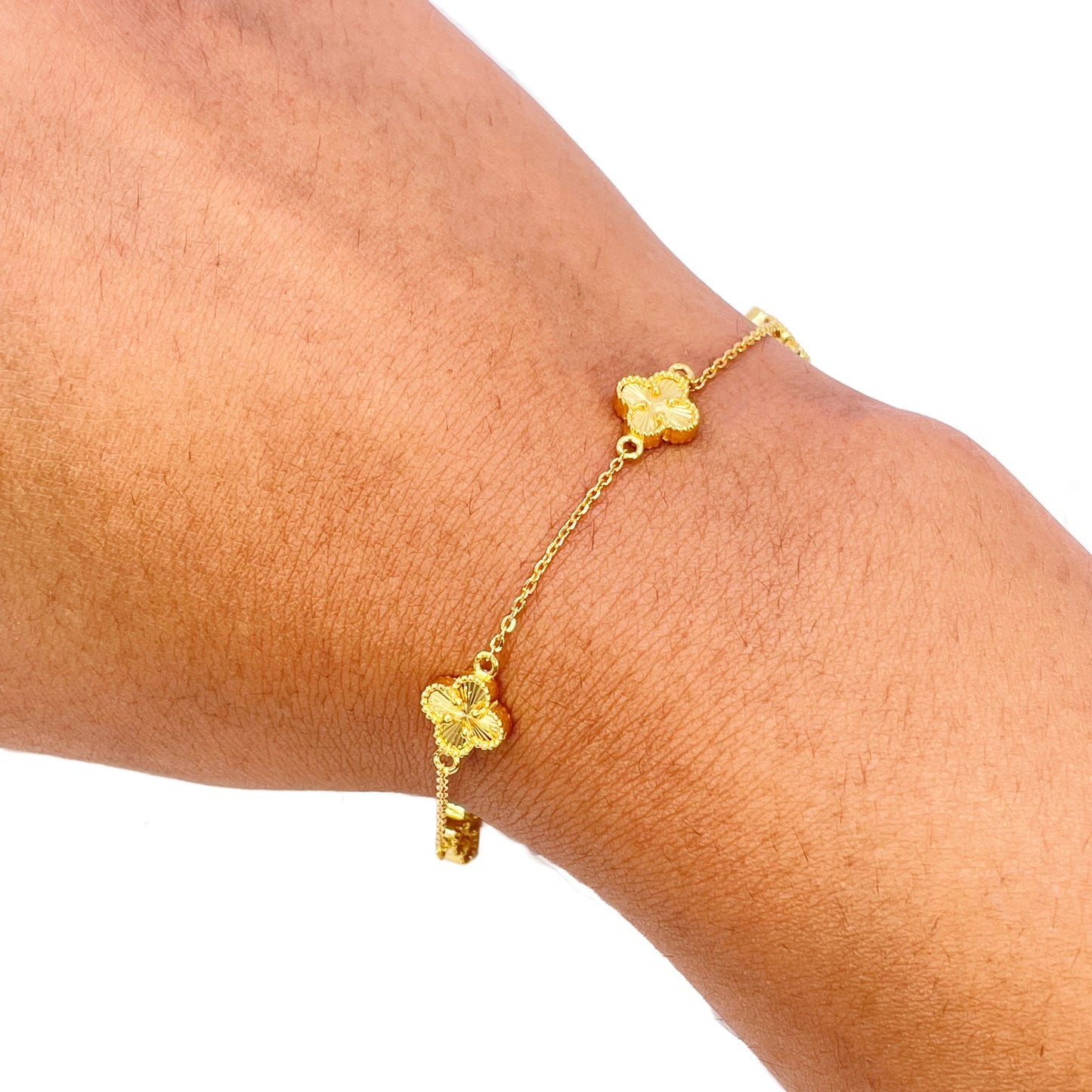 Bracelet 7,5 pouces en or jaune 22 carats avec 5 trèfles floraux taillés en diamant